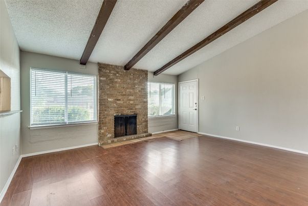 Empty room, Fireplace, Interior, Stone Walls, Wooden Beams, Wood Texture Flooring
