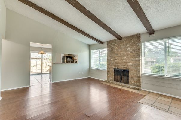 Empty room, Fireplace, Interior, Stone Walls, Wooden Beams, Wood Texture Flooring