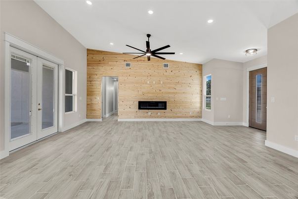 Empty room, Fireplace, Interior, Recessed Lighting, Wood Texture Flooring, Wooden Walls