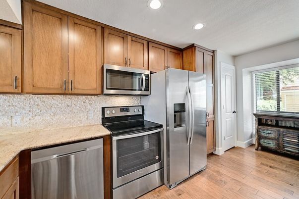 Interior, Kitchen, Recessed Lighting, Stainless Steel Appliances, Wood Texture Flooring