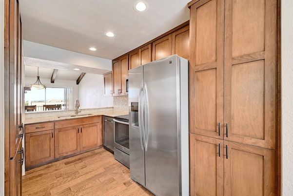 Interior, Kitchen, Recessed Lighting, Stainless Steel Appliances, Wood Texture Flooring