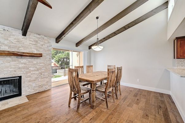 Dining room, Fireplace, Interior, Pendant Lights, Stone Walls, Wooden Beams, Wood Texture Flooring