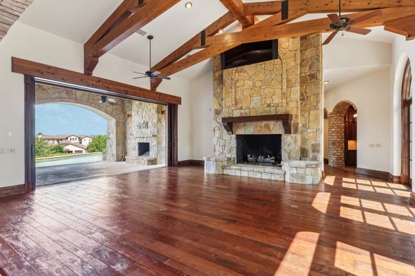 Empty room, Fireplace, Interior, Stone Walls, Wooden Beams, Wood Texture Flooring