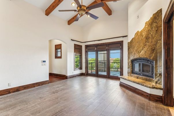Empty room, Fireplace, Interior, Recessed Lighting, Wooden Beams, Wood Texture Flooring