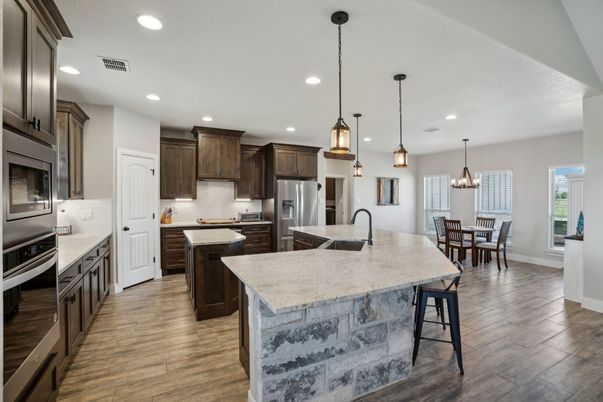 Chandelier, Dining room, Interior, Kitchen, Pendant Lights, Recessed Lighting, Stainless Steel Appliances, Wood Texture Flooring
