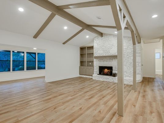 Empty room, Fireplace, Interior, Recessed Lighting, Stone Walls, Wooden Beams, Wood Texture Flooring
