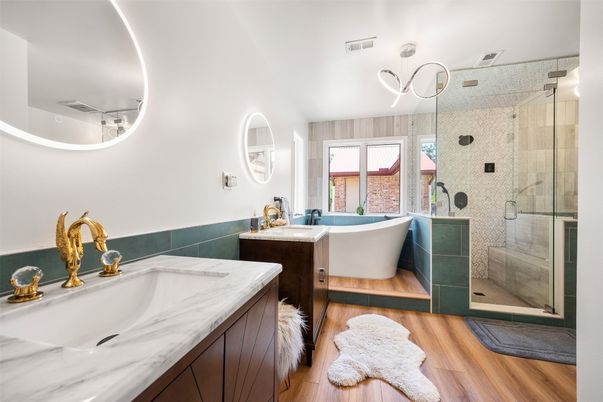Bathroom, Dual Sink Vanities, Free Standing Baths, Glass Shower, Interior, Wood Texture Flooring