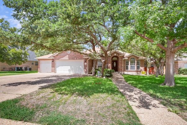 Attached, Backyard, Exterior, Facade, Brick Facade, Ranch