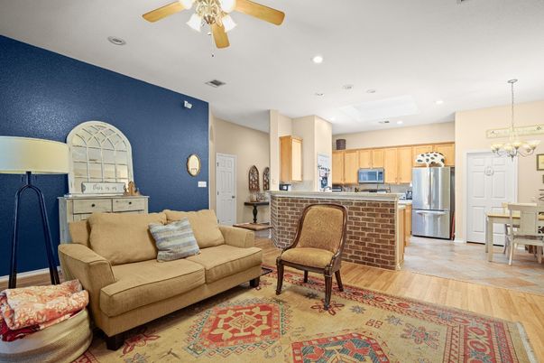 Chandelier, Dining room, Interior, Kitchen, Living room, Recessed Lighting, Stainless Steel Appliances, Wood Texture Flooring