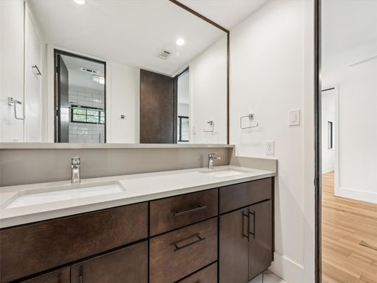 Bathroom, Dual Sink Vanities, Interior, Recessed Lighting, Wood Texture Flooring