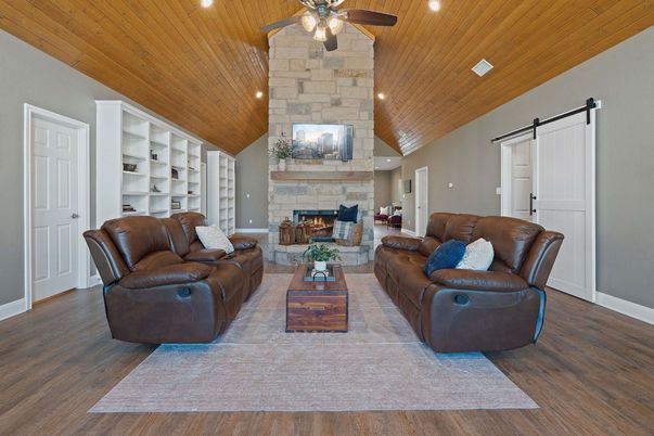 Fireplace, Interior, Living room, Recessed Lighting, Stone Walls, Wooden Ceilings, Wood Texture Flooring