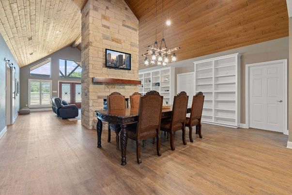 Dining room, Fireplace, Interior, Pendant Lights, Stone Walls, Wooden Ceilings, Wood Texture Flooring
