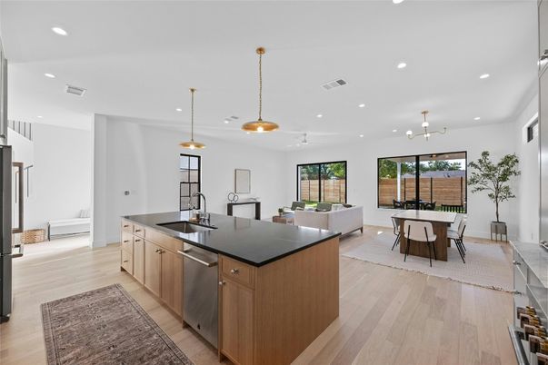 Dining room, Interior, Kitchen, Living room, Pendant Lights, Recessed Lighting, Stainless Steel Appliances, Wood Texture Flooring