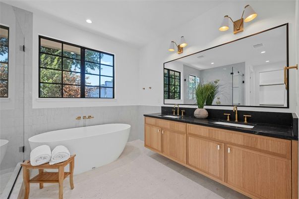 Bathroom, Dual Sink Vanities, Free Standing Baths, Glass Shower, Interior, Marble Walls, Recessed Lighting