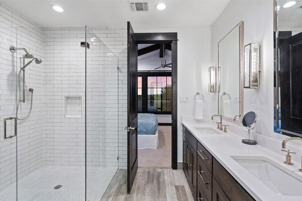 Bathroom, Dual Sink Vanities, Glass Shower, Interior, Recessed Lighting, Wood Texture Flooring