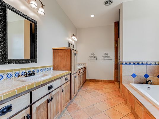 Bathroom, Dual Sink Vanities, Interior, Recessed Lighting, Tile Countertops
