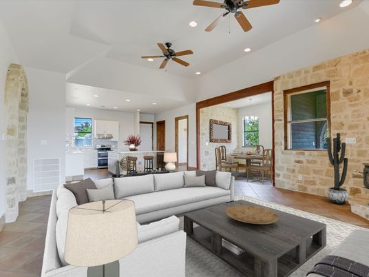 Chandelier, Dining room, Interior, Kitchen, Living room, Pendant Lights, Recessed Lighting, Stainless Steel Appliances, Stone Walls