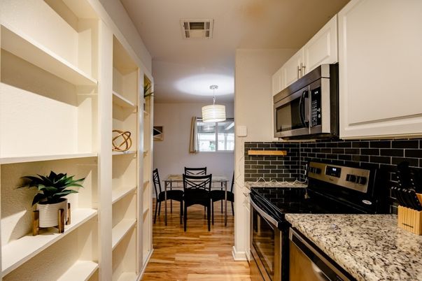 Dining room, Interior, Kitchen, Pendant Lights, Stainless Steel Appliances, Wood Texture Flooring
