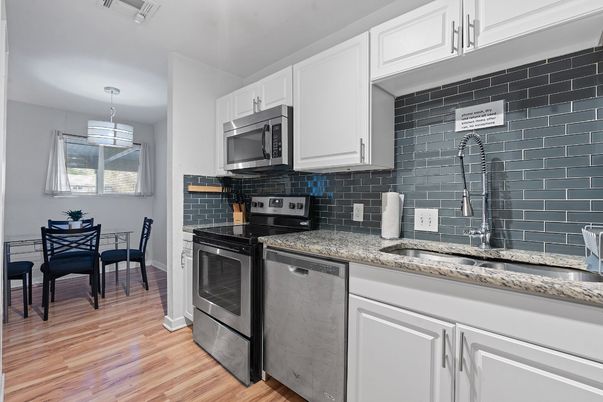 Dining room, Interior, Kitchen, Pendant Lights, Stainless Steel Appliances, Wood Texture Flooring