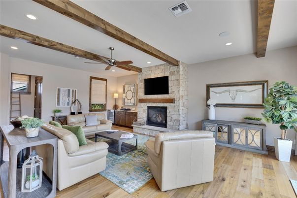 Fireplace, Interior, Living room, Recessed Lighting, Stone Walls, Wooden Beams, Wood Texture Flooring