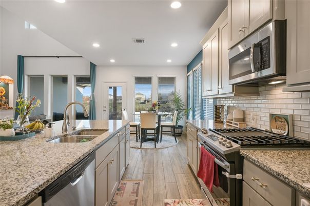 Dining room, Interior, Kitchen, Recessed Lighting, Stainless Steel Appliances, Wood Texture Flooring