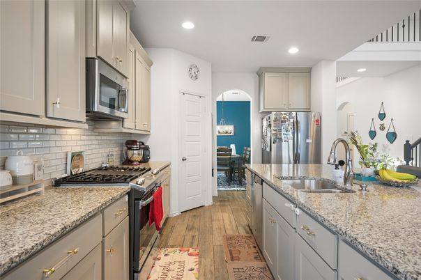 Dining room, Interior, Kitchen, Recessed Lighting, Stainless Steel Appliances, Wood Texture Flooring