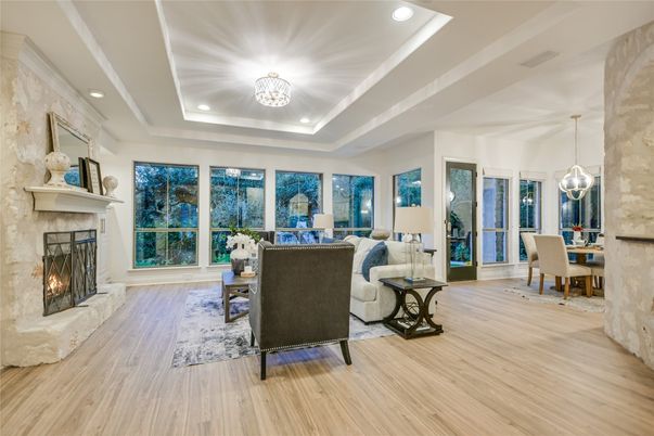 Dining room, Fireplace, Interior, Living room, Pendant Lights, Recessed Lighting, Wood Texture Flooring