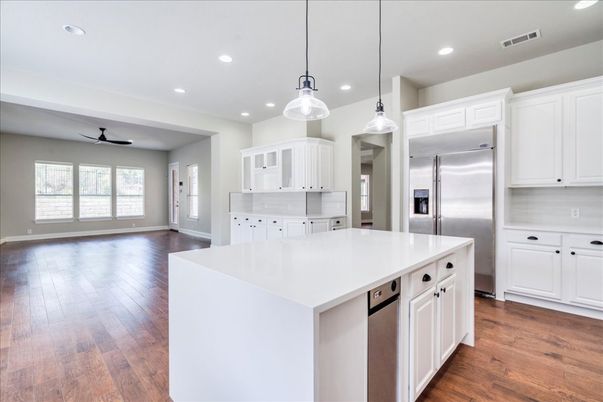Empty room, Fireplace, Interior, Kitchen, Pendant Lights, Recessed Lighting, Wood Texture Flooring