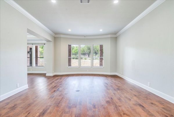 Interior, Kitchen, Pendant Lights, Recessed Lighting, Stainless Steel Appliances, Stone Walls, Wood Texture Flooring