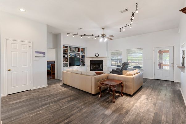 Fireplace, Interior, Living room, Recessed Lighting, Wood Texture Flooring