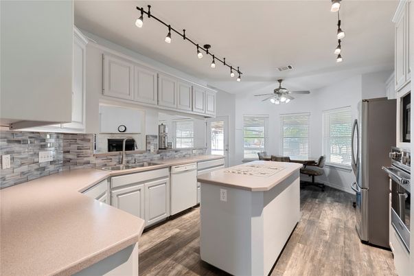 Dining room, Interior, Kitchen, Pendant Lights, Stainless Steel Appliances, Wood Texture Flooring