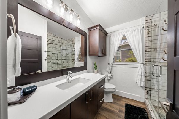 Bathroom, Dual Sink Vanities, Glass Shower, Interior, Wood Texture Flooring