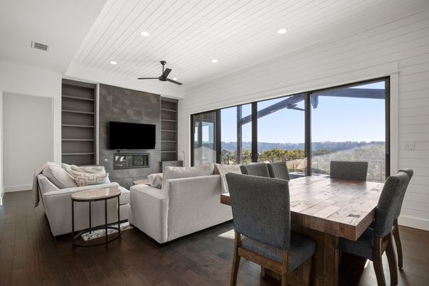 Dining room, Fireplace, Interior, Living room, Recessed Lighting, Wood Texture Flooring