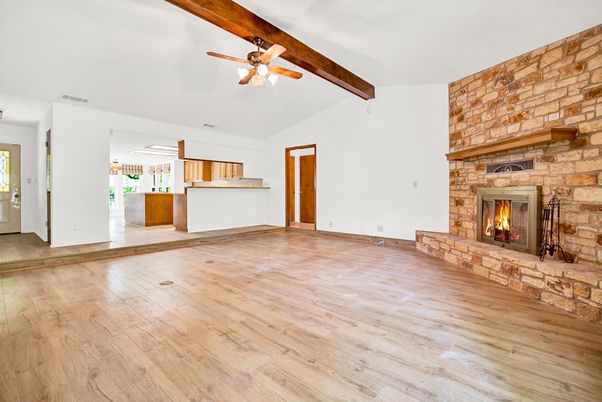 Empty room, Fireplace, Interior, Stone Walls, Wooden Beams, Wood Texture Flooring
