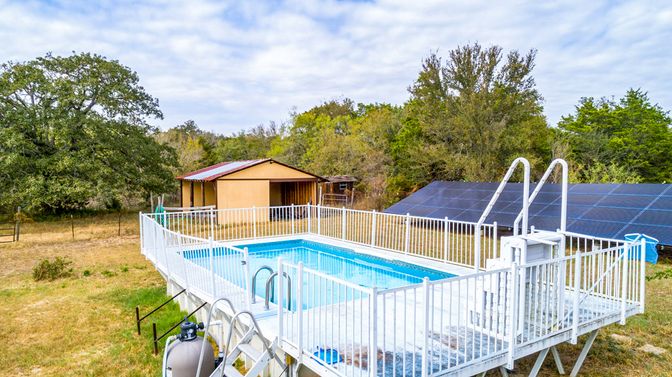 Exterior, Pool, Solar Panels