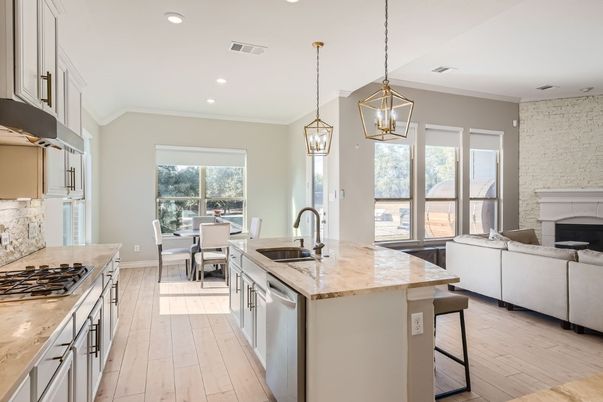 Dining room, Fireplace, Interior, Kitchen, Living room, Pendant Lights, Recessed Lighting, Stainless Steel Appliances, Stone Walls, Wood Texture Flooring