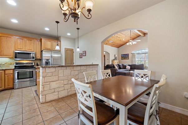 Dining room, Interior, Kitchen, Living room, Pendant Lights, Recessed Lighting, Stainless Steel Appliances, Wooden Ceilings