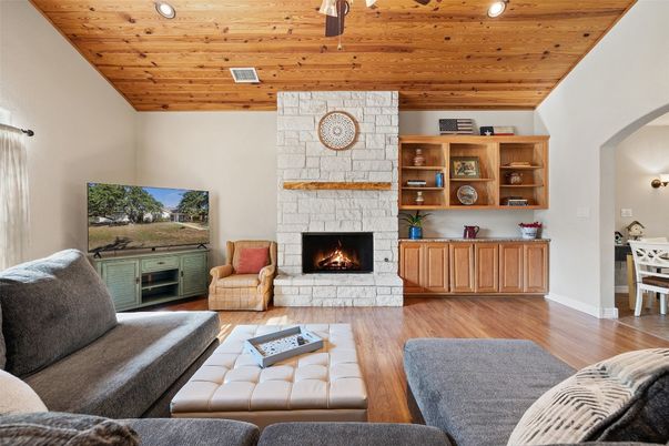 Fireplace, Interior, Living room, Recessed Lighting, Stone Walls, Wooden Ceilings, Wood Texture Flooring