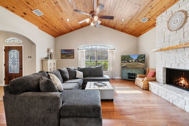 Fireplace, Interior, Living room, Recessed Lighting, Stone Walls, Wooden Ceilings, Wood Texture Flooring