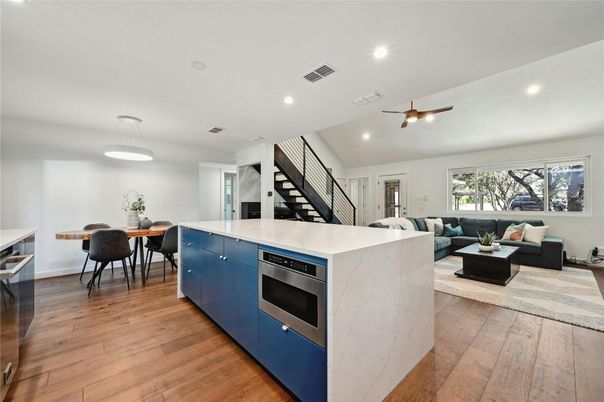 Dining room, Interior, Kitchen, Living room, Pendant Lights, Recessed Lighting, Stainless Steel Appliances, Wood Texture Flooring
