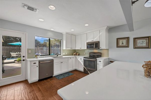 Interior, Kitchen, Recessed Lighting, Stainless Steel Appliances, Wood Texture Flooring