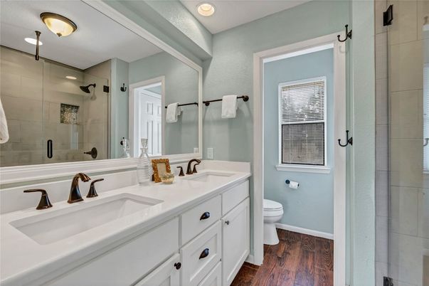Bathroom, Dual Sink Vanities, Interior, Recessed Lighting, Wood Texture Flooring