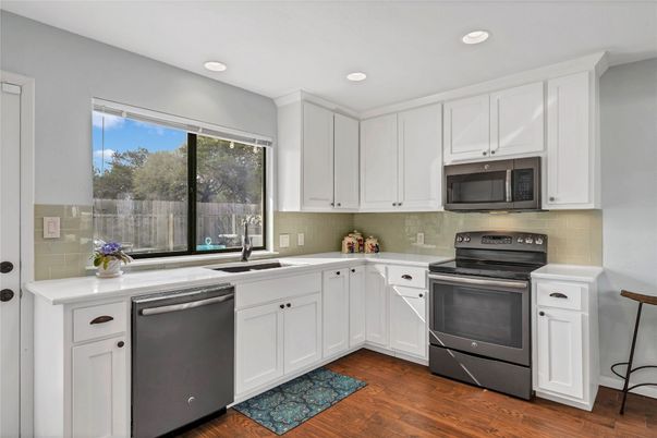 Interior, Kitchen, Recessed Lighting, Stainless Steel Appliances, Wood Texture Flooring