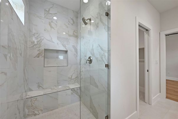 Bathroom, Glass Shower, Interior, Marble Walls, Recessed Lighting, Wood Texture Flooring