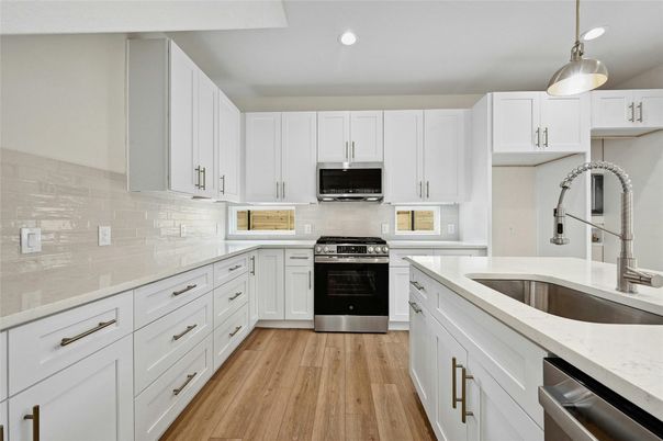 Interior, Kitchen, Pendant Lights, Recessed Lighting, Stainless Steel Appliances, Wood Texture Flooring