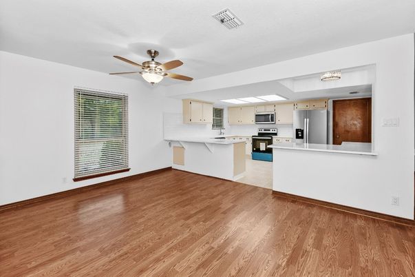 Empty room, Interior, Kitchen, Stainless Steel Appliances, Wood Texture Flooring