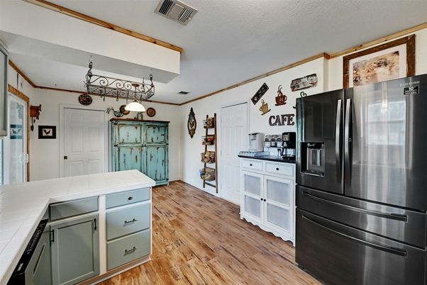 Interior, Kitchen, Tile Countertops, Wood Texture Flooring