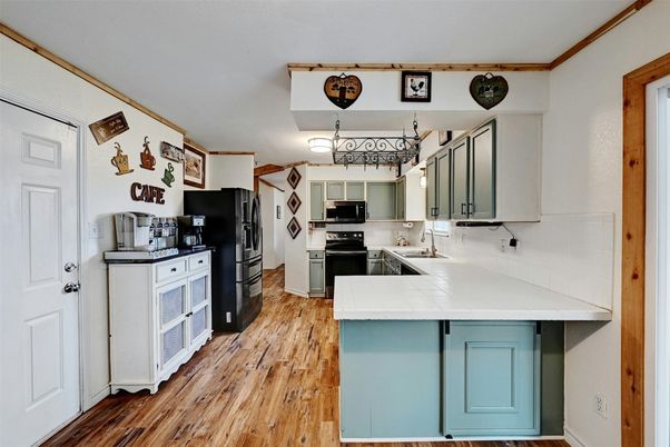 Interior, Kitchen, Tile Countertops, Wood Texture Flooring