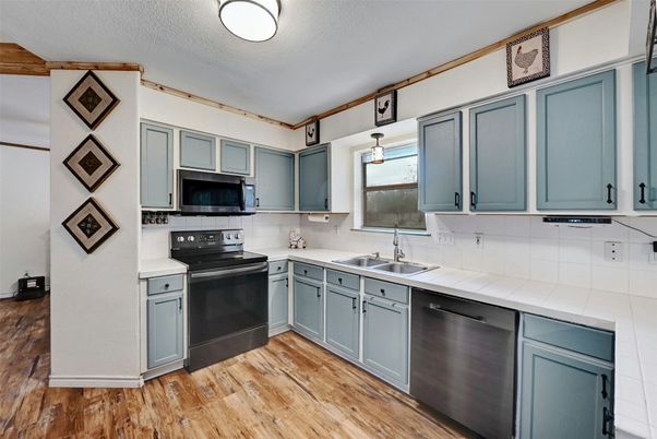 Interior, Kitchen, Tile Countertops, Wood Texture Flooring