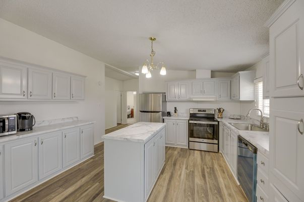 Interior, Kitchen, Pendant Lights, Stainless Steel Appliances, Wood Texture Flooring